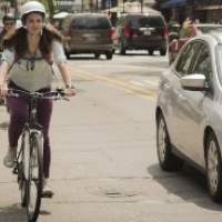 A commuter gets around downtown on his bike.